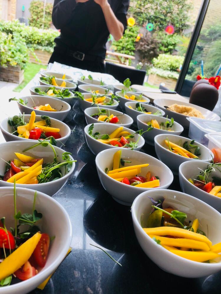 Mango, tomato and pea shoot salad