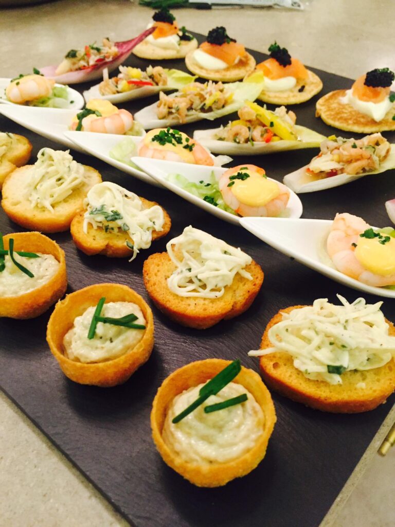 Rogério's team serving Brazilian cuisine at a private event