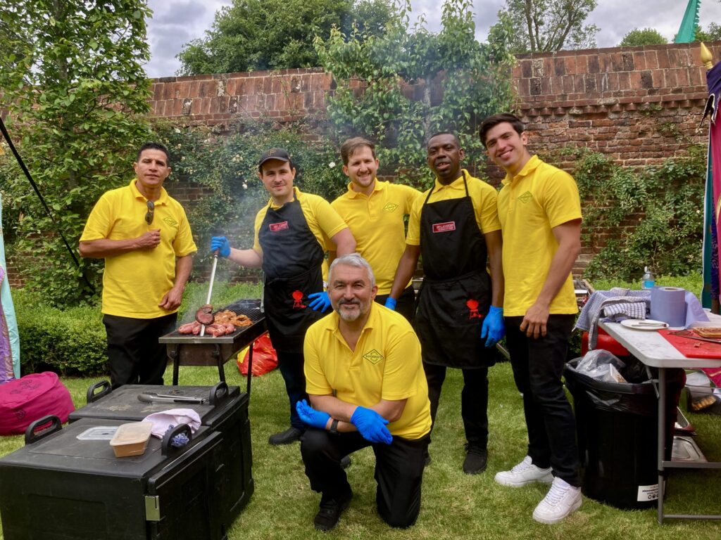 Guests enjoying Brazilian catering at a private event